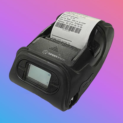 Black portable printer with a printed label on a gradient background